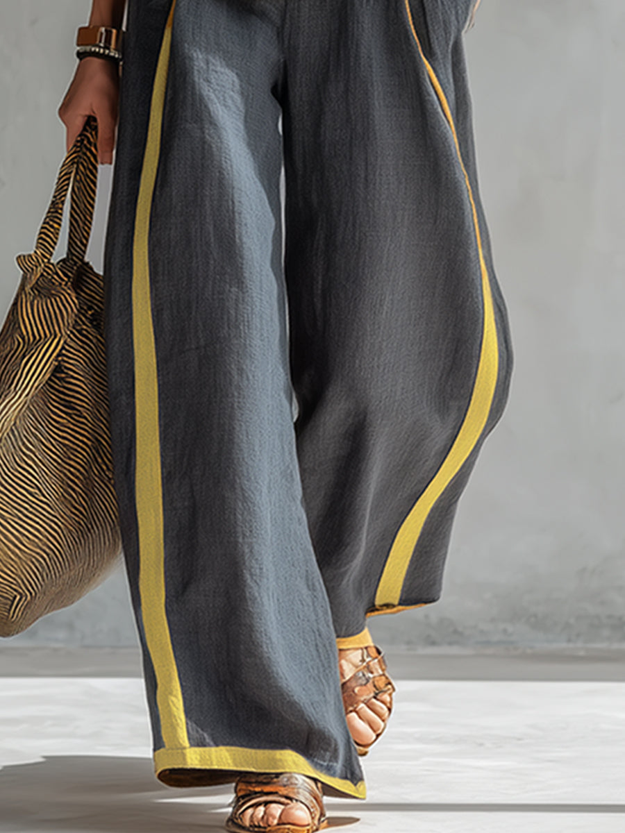 Sofía | Completo grigio con profili a contrasto